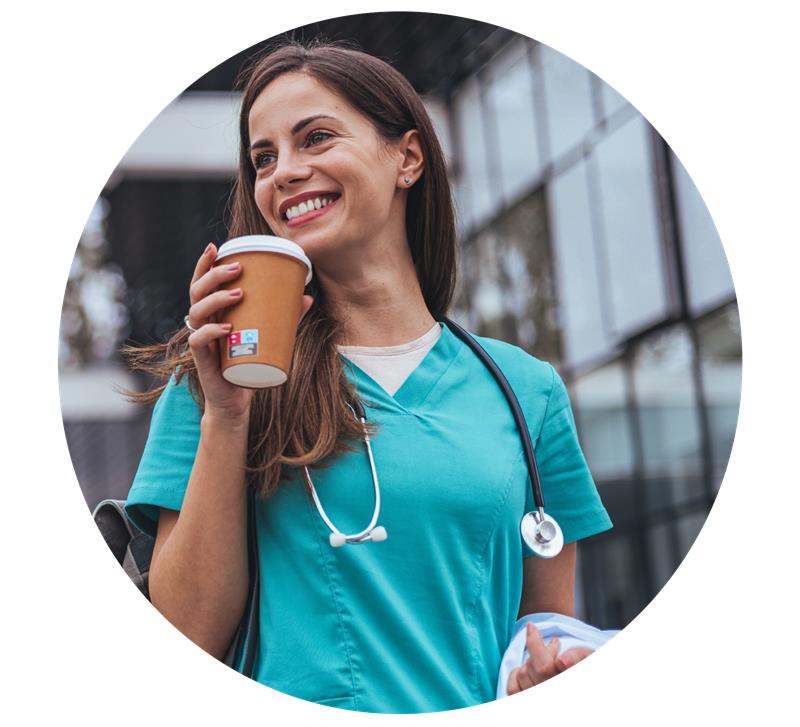 An image of a smiling nurse in her uniform drinking a coffee. The image links to our Free uniform tax refund guide.